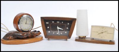 A group of three vintage retro 20th century mantle clocks to include a Metamec bedside clock and