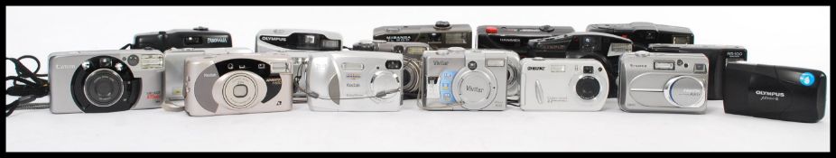 A selection of digital and film cameras to include a Kodak EasyShare CX4300, Sony Cyber-shot 3.2 &