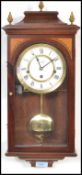 A 20th century modern Comitti of London mahogany inlaid drop dial wall clock with roman numeral