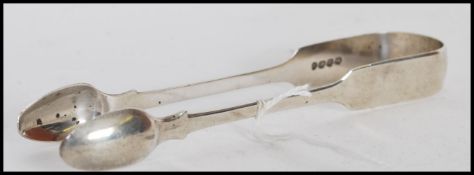 A pair of Charles Shipway 19th Century Georgian silver hallmarked sugar tongs. Hallmarked London