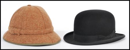 Two vintage hats to include a gentleman's bowler hat by G. A. Dunn & Co Ltd, along with a J. S.