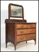 A late 19th Century Victorian burr walnut dressing table chest, swing mirror to the top over two