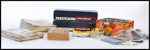 A collection of vintage Meccano magazines dating from the mid 20th Century together with Meccano