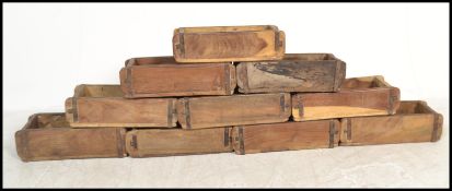 SET OF 10 MID CENTURY STACKING WOODEN INDUSTRIAL BRICK MOULDS