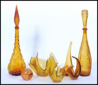 A collection of vintage retro 20h century amber glass studio art glass to include two Italian