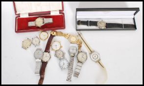 A group of vintage gents watches to include Acola, Mirage, Accurist, Roamer, Swatch, Derrick, Times,