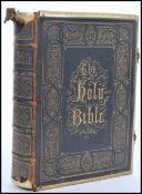 A 19th Century 'Holy Bible with marginal readings and parallel references and the commentaries of