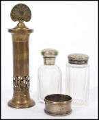 An early 20th Century Prometheus brass Shaving Lamp by W. H. Williams having pierced decoration to