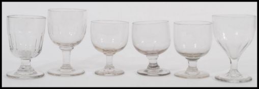 A harlequin set of 19th Century rummer glasses to include Georgian and Victorian examples to include