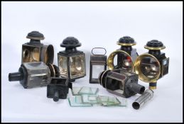 A large group of antique carriage lamps of varying form dating from the late 19th century most