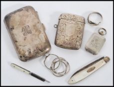 A collection of silver hallmarked and silver plate items to include a hallmarked cheroot case,