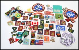 A collection of vintage 20th Century Scout badges and stickers dating from the 1970's to include