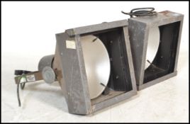 A good pair of large mid 20th century Industrial Strand Electric Theatre Spot lights with bracket