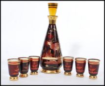 A vintage retro 20th century 1960's decanter and six glass set having gilt decoration with