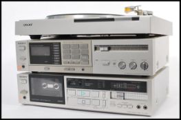 A vintage retro 20th Century Sony stacking music system, record deck, radio and amplifier having a