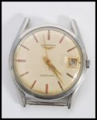 A vintage 20th Century Longines wrist watch having stick markings to the chapter ring and faceted