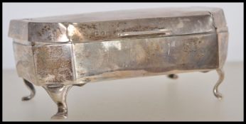 A silver hallmarked Art Deco lidded trinket pot, machine turned top with central lozenge