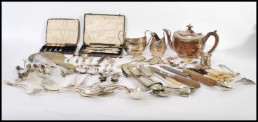 A collection of silver plated wares to include tea service, cased sets of cutlery, various flatware,