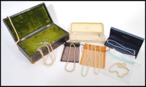 A collection of eight pearl and faux pearl necklaces, the necklaces dating from the first half of