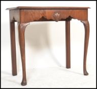 An 18th century Georgian mahogany Irish side table, the side table raised on large cabriole legs