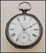 A 19th century Victorian silver hallmarked pocket watch having a fusee movement. The white enamel