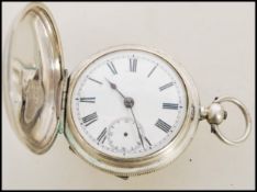 A 19th century Victorian silver 935 full hunter pocket watch having a fusee movement. The white