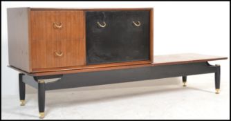 A vintage retro 20th century G-Plan Librenza coffee table along with a matching G-Plan cabinet.