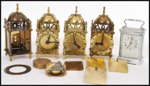 A group of vintage Smiths Bell top clocks having brass finials and Roman numeral chapterrings