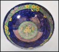 A vintage early 20th century Mailing lustre bowl in the Primrose pattern 6403. Raised on small
