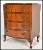 A 20th century Regency Revival mahogany bow fronted chest of drawer raised on cabriole legs.