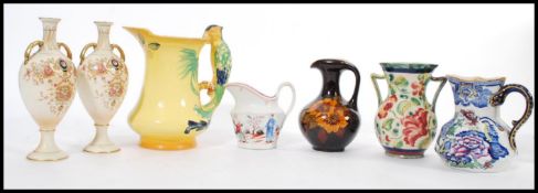 A collection of vintage ceramics to include a Burleigh Ware Parrot jug, Mason's jug, a small Chinese