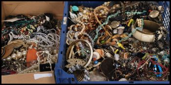 A large collection of costume jewellery to include a selection of beaded necklaces including