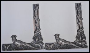 A pair of vintage early 20th century silver white metal menu holders of perpendicular form having