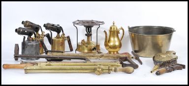 A group of vintage early 20th century metal wares to include preserve pan, pumps, bellows, tools