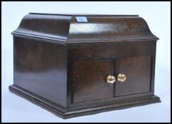 A vintage early 20th century oak cased table gramophone record player my HMV His Master's Voice.