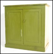 A 19th Century Victorian industrial / school painted pine cupboard / sideboard, fitted with two