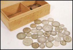 A collection of coins daing from 1829, to include Georgian silver shillings, a 1890 silver Jubilee