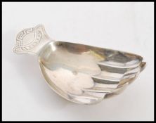 A stunning silver hall marked caddy spoon in the form of a hand, Birmingham assay mark, dating to