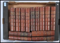 A large selection of french novels to include a collection of multiple volumes of leather bound