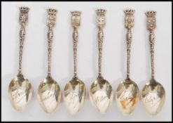 A collection of six French silver hallmarked souvenir tea spoons, the spoons with town crests to the