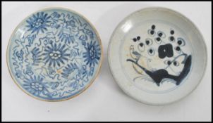 Two 18th century Chinese plates one having blue and white decoration and blue character mark to base