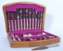 A vintage retro 20th century canteen of silver plated cutlery by Seymour of Sheffield in the Kings