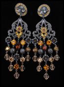 A pair of signed vintage Askew of London silver-tone chandelier earrings decorated with maple