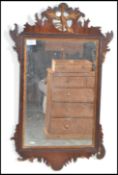 A 19th century mahogany framed Pier mirror having a central glass panel with wooden frame