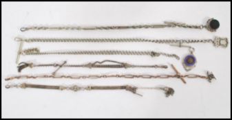 A group of vintage early 20th century Albert pocket watch chains to include silver hallmarked