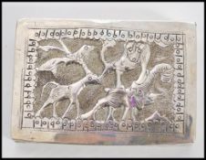 A continental silver 800 African snuff / trinket box having decoration of safari animals including