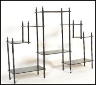 A 20th century Japanese lacquer what not / etagere stand having hand painted decoration depicting