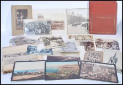 A large collection of assorted photographs dating from the late 19th century some of military