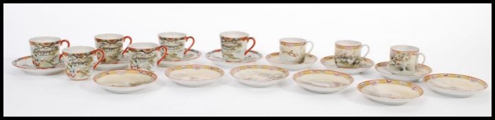 A group of nine 19th century Japanese eggshell china tea cups and saucers being hand painted with