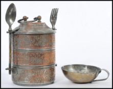 An early 20th century Indian / Middle eastern copper and brass Tiffin sectional lunch box having